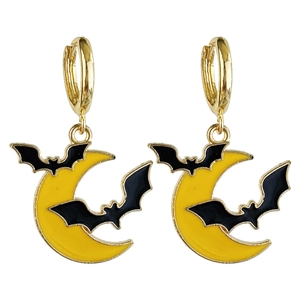 Detail of golden hoop earrings featuring yellow crescent moon and black enamel bats