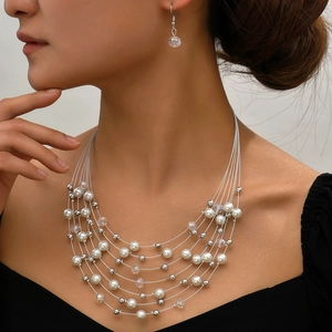 Bohemian multi-layer beaded necklace and earrings set with pearls and crystals