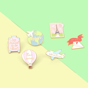 Travel theme enamel pins set with airplane hot air balloon and earth icons