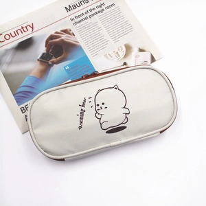 Detail showing the running bear print and durable zipper on the canvas pencil case