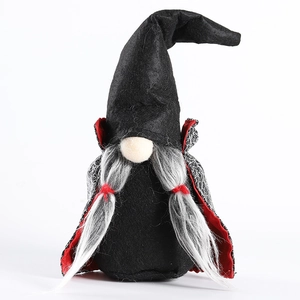 Halloween gnome plush with black witch cloak and gray braided beard on white background