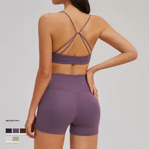Morandi purple yoga set featuring cross-back sports bra and high-waist fitness shorts