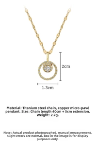 Macro shot of gold-plated double circle pendant necklace with sparkling micro-pave zircons