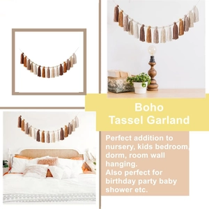 Detail of Boho garland featuring natural wood beads and multicolored yarn tassels decor