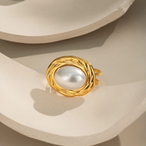 Retro 18K gold plated stainless steel open ring with a large oval white pearl centerpiece