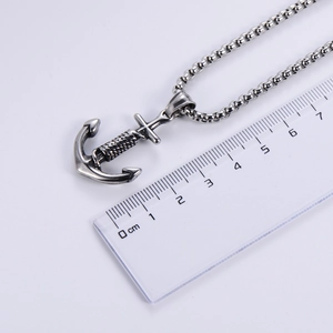 Vintage stainless steel anchor pendant necklace with ruler showing 4.5cm size