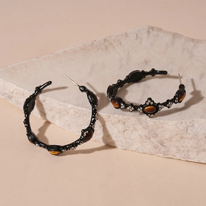 Vintage black C-shaped hoop earrings with oval tiger eye stones and sparkling crystals