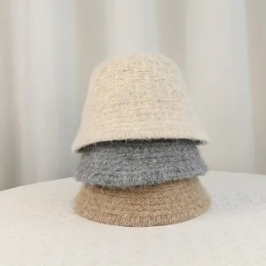Winter plush knitted bucket hat for women in beige, grey and brown warm colors