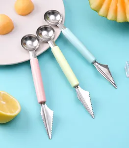 Close-up of 3-piece stainless steel fruit melon baller and carving tool set in pastel colors