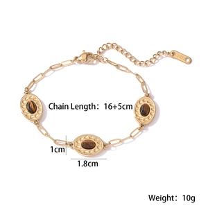 Detail view of 18K gold plated stainless steel bracelet with brown tiger eye stones