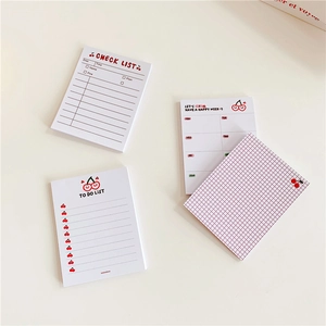Flat lay of cute cherry note pads including check list, to-do list, and weekly plan styles