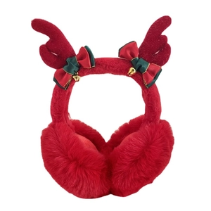 Plush red Christmas earmuffs with reindeer antlers and festive bells for winter warmth