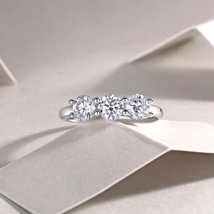 Macro detail of high-quality S925 silver ring featuring three brilliant-cut round moissanite