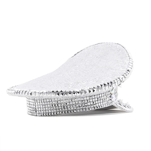 Detail of silver sequined punk captain hat featuring metallic studs and crystal accents