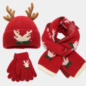 Close-up of red Christmas 3-piece set with 3D antlers and festive jacquard knitting