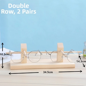 Detail view of pine wood eyewear display stand with dimensions 34.5x10.2x14.3cm