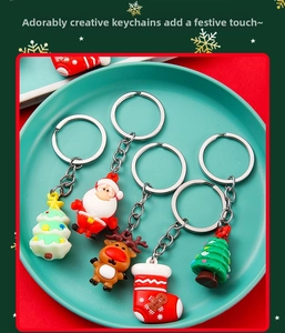 Detailed view of PVC Christmas keychains featuring Santa, reindeer, and tree designs