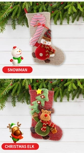 Detail of knitted Christmas stockings featuring 3D snowman and elk characters for decor