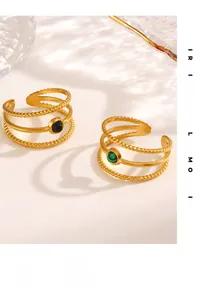 Detailed view of 18K gold plated stainless steel triple-layer ring with natural gemstones