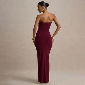 Rear view of sleek wine red strapless floor-length evening gown with bodycon fit