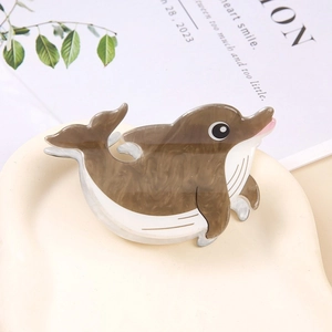 Cute brown and white dolphin hair claw clip made of acetic acid material for women