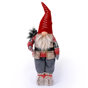 Standing Christmas gnome decoration with red pointed hat and faux fur vest on white background