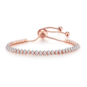 Detail of rose gold tennis bracelet featuring marquise-cut crystals and adjustable pull clasp