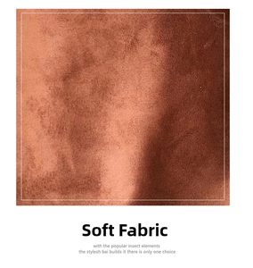 Close-up of soft caramel faux suede fabric showing rich texture and premium matte finish
