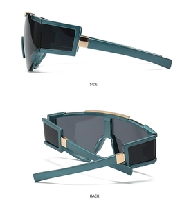 Side and back view of oversized teal shield sunglasses with golden metal hinge details