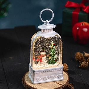 Vintage silver Christmas lantern with snowman and glowing LED lights for tabletop decor