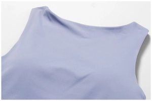 Macro shot of seamless neckline detail on light purple high-density yoga sports bra