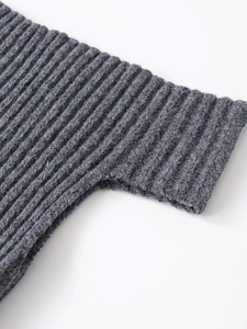 Close-up view of the rib-knit texture and soft gray fabric of this casual winter top