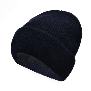 Detailed close-up of ribbed knit texture and soft fleece lining of the wool winter beanie