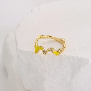 Irregular geometric wave open ring with 18K gold plating, yellow enamel, and cubic zirconia