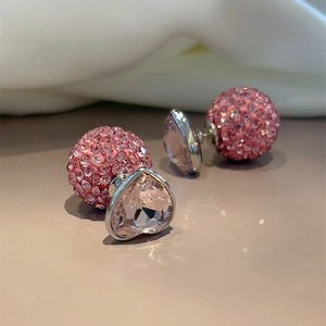 Pink heart-shaped crystal stud earrings with pavé ball back in vintage style