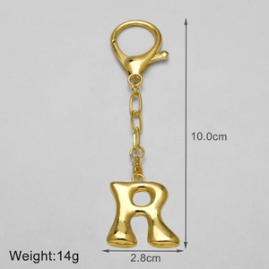 Detail showing the 10cm gold letter R keychain with precise dimensions and weight specs