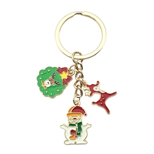 Christmas keychain set with enamel Santa snowman reindeer pendants and gold metal ring