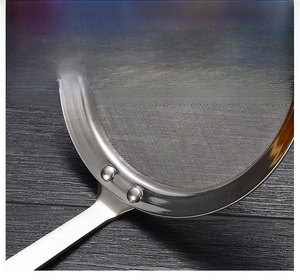 Detail of 304 stainless steel fine mesh strainer with reinforced double rivet handle joinery