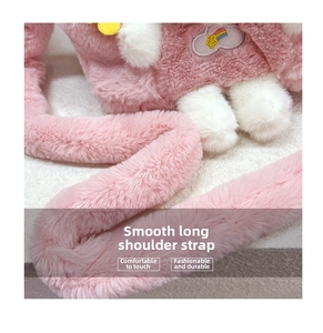 Detail of soft pink plush shoulder strap with thick texture and rainbow embroidery