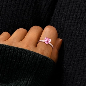 S925 sterling silver ring with pink heart zircon stone worn on a black sweater background