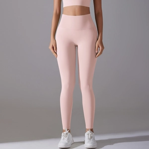 Front view of light pink high waist yoga leggings and matching sports bra set