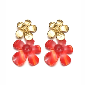 Elegant gold and red flower drop earrings with a metallic and acrylic finish