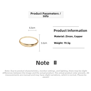 Detail view of 18k gold plated bangle with zircon stones and dimensions 6.5cm by 5.5cm