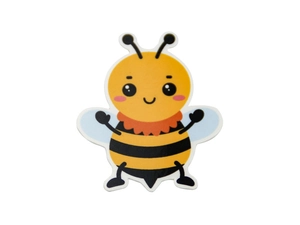 Detail of cute yellow cartoon bee decoration with soft wings and friendly face