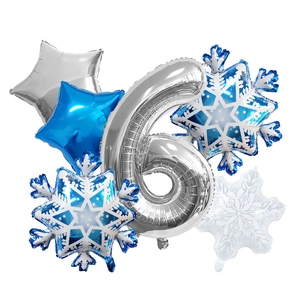 Close-up of blue snowflake and silver number balloons for birthday party decoration