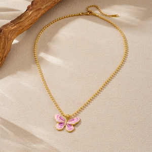 Gold-plated chain necklace featuring a pink enamel butterfly and pearl tulip pendant