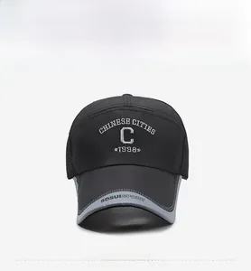 Detail of black baseball cap with grey piping and Chinese Cities 1998 embroidery