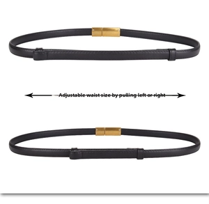 Close-up of black leather slim belt showing pull-to-adjust mechanism for custom waist size