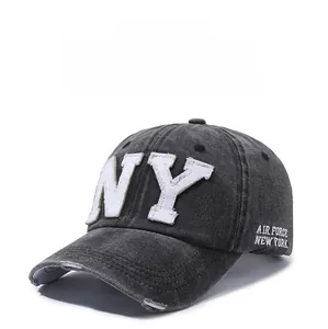 Detail of distressed dark grey baseball cap with white NY 3D letter embroidery