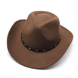 Detail view of dark brown wool felt cowboy hat with studded black leather belt decoration
